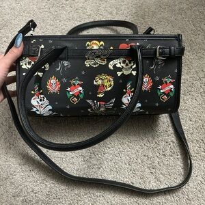 Ed Hardy Black Tattoo Motif Cylinder Satchel with Multicolor Prints